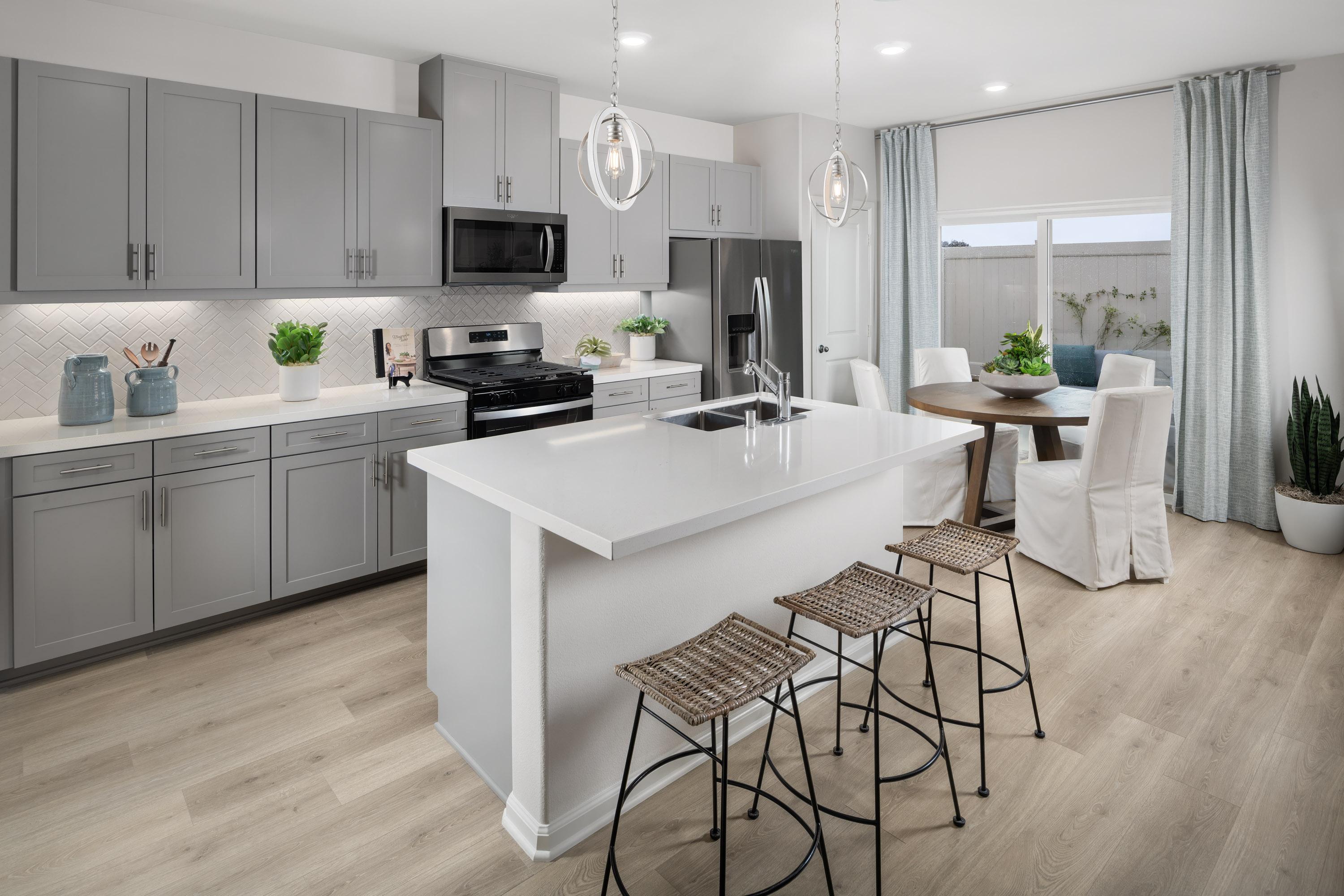 Kitchen with center island. Beazer Homes is now building 100% Energy Series READY homes in Southern California. 